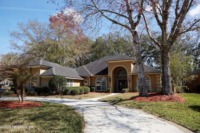 view of front of property with a front lawn