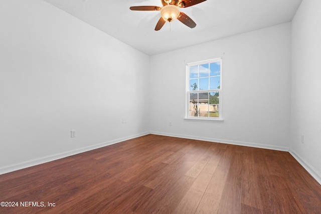 unfurnished room featuring hardwood / wood-style flooring and ceiling fan