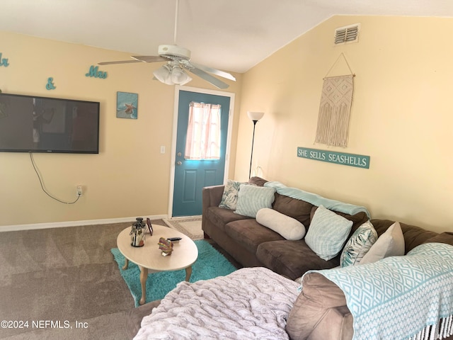 living room featuring carpet, ceiling fan, and lofted ceiling