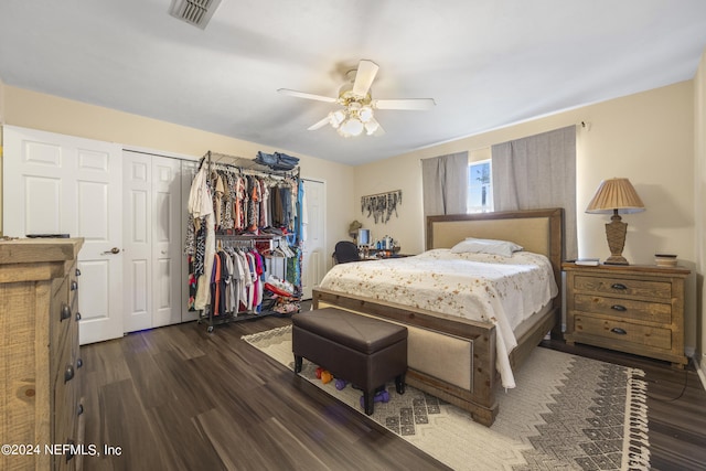 bedroom featuring ceiling fan and dark hardwood / wood-style floors