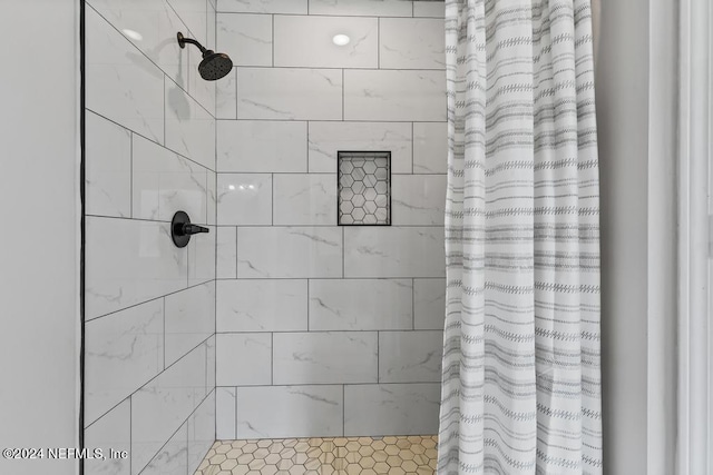 bathroom featuring a shower with curtain