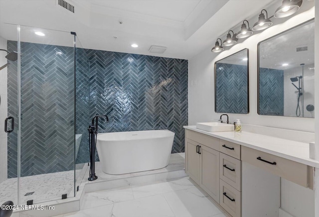 bathroom with vanity, plus walk in shower, ornamental molding, and tile walls