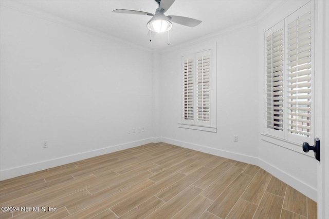 spare room featuring ceiling fan, crown molding, and light hardwood / wood-style floors