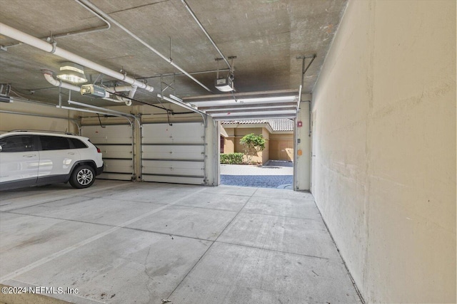 garage featuring a garage door opener