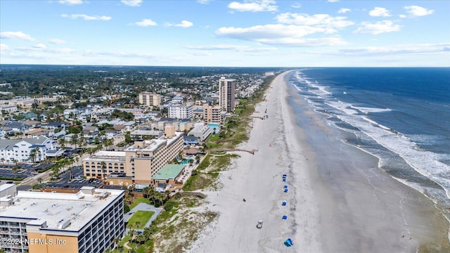 bird's eye view with a view of the beach and a water view