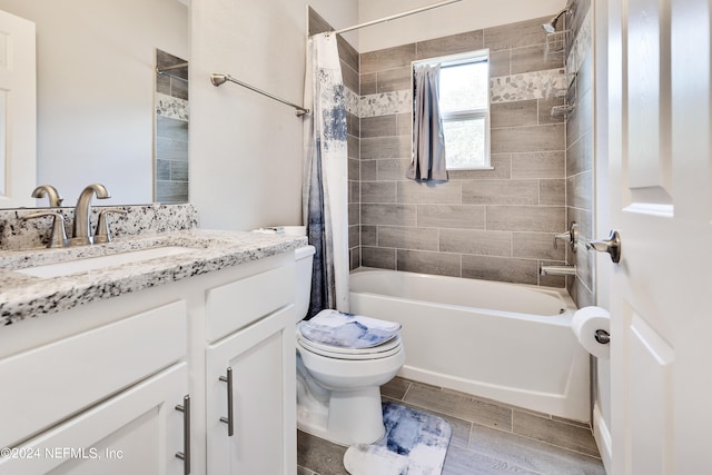 full bathroom with vanity, toilet, and shower / bath combination with curtain