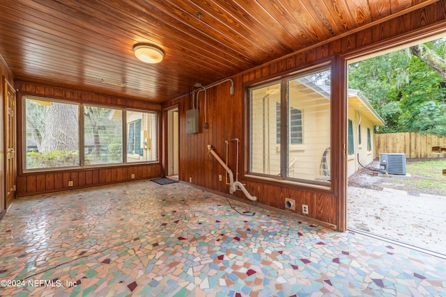 unfurnished sunroom featuring wooden ceiling and a healthy amount of sunlight