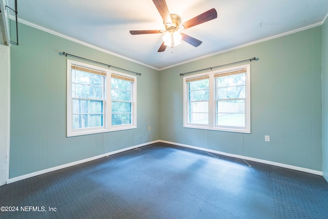 spare room with crown molding and ceiling fan