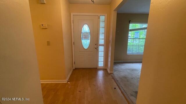 foyer featuring hardwood / wood-style floors