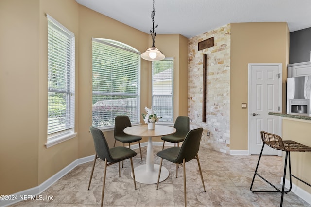 dining room featuring light tile patterned floors