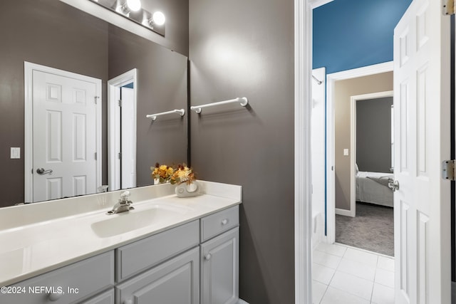 bathroom with vanity and tile patterned floors