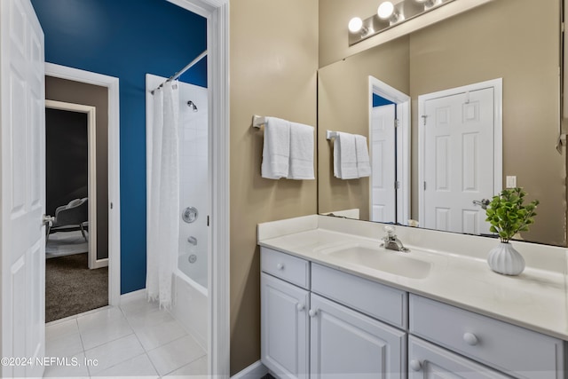 bathroom with vanity, tile patterned flooring, and shower / bath combo