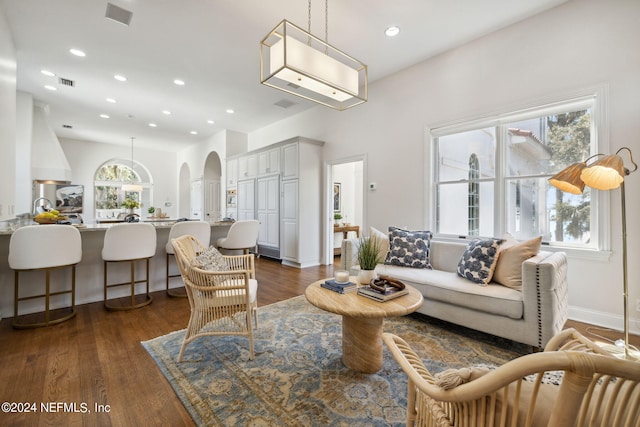 living room with dark wood-type flooring