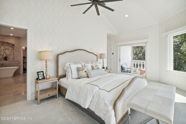 bedroom with multiple windows, vaulted ceiling, ceiling fan, and hardwood / wood-style flooring