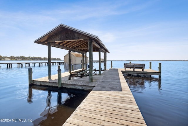 view of dock with a water view