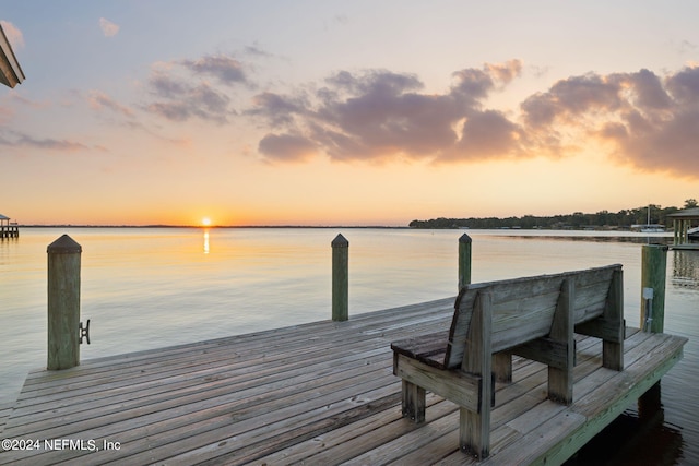 view of dock with a water view