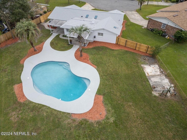 view of pool with a fenced backyard