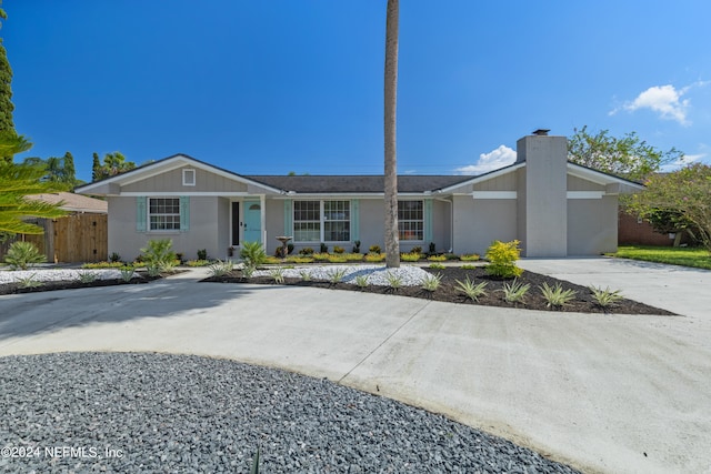 ranch-style house with a garage