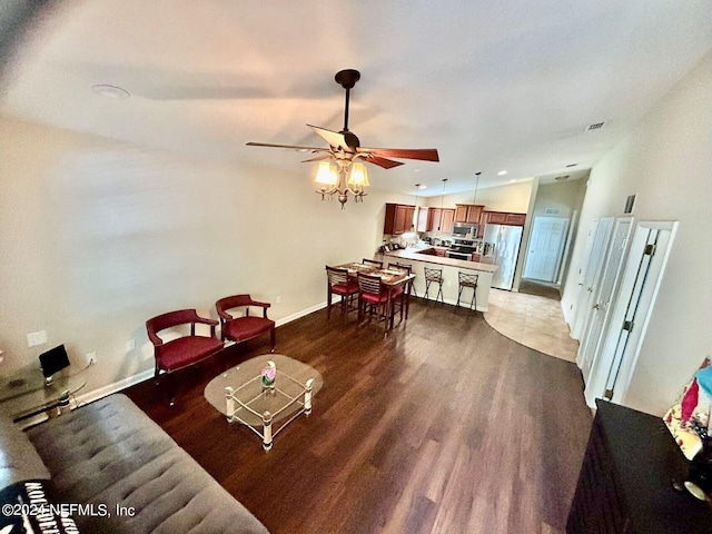 living room with hardwood / wood-style flooring and ceiling fan