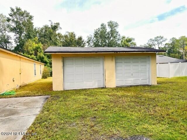 4833 De Kalb Ave, Jacksonville, FL 32207 - detached garage featuring fence