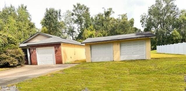 garage with a lawn