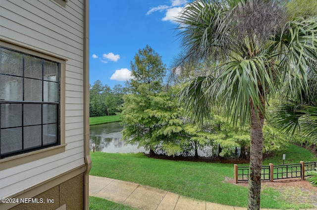 view of yard with a water view