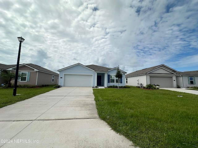 ranch-style house with a front yard and a garage