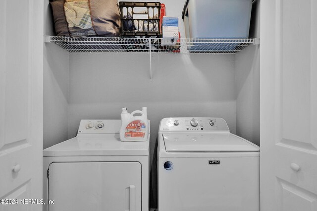 laundry room with washer and dryer