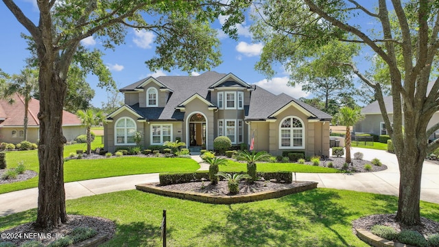 view of front of home featuring a front yard