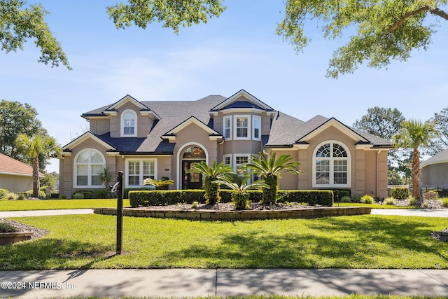 view of front of house with a front yard