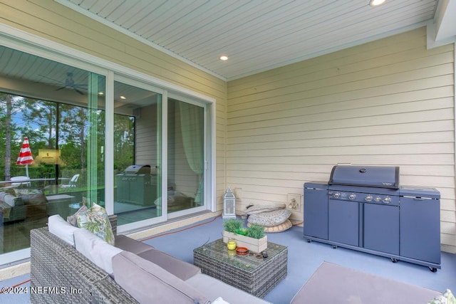 view of patio with an outdoor living space and grilling area