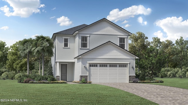 view of front facade with a garage and a front yard