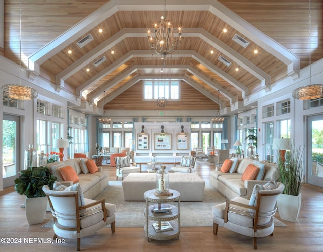 63 Oakmoss Dr, Saint Johns, FL 32259 - living area featuring high vaulted ceiling, a notable chandelier, a wealth of natural light, and visible vents