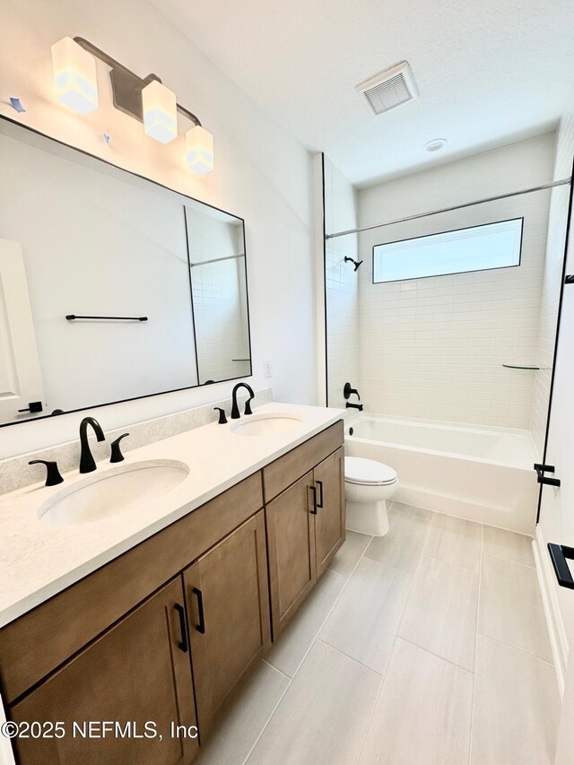 63 Oakmoss Dr, Saint Johns, FL 32259 - bathroom with visible vents, a sink, tub / shower combination, and double vanity