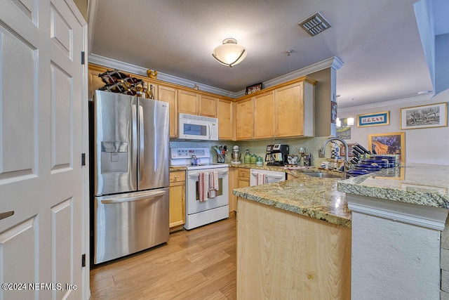 kitchen with appliances with stainless steel finishes, crown molding, kitchen peninsula, and light brown cabinets