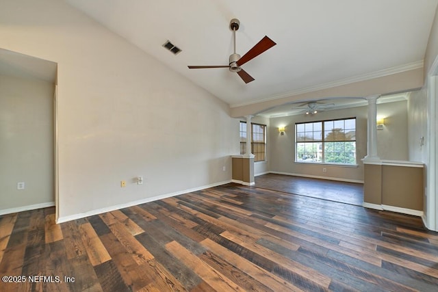 unfurnished room with vaulted ceiling, ceiling fan, decorative columns, and dark hardwood / wood-style floors