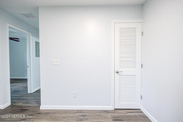 spare room featuring dark hardwood / wood-style flooring