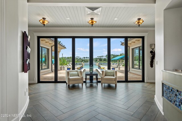 living room with french doors, parquet floors, wooden ceiling, a water view, and ornamental molding