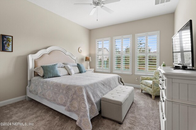 carpeted bedroom featuring ceiling fan