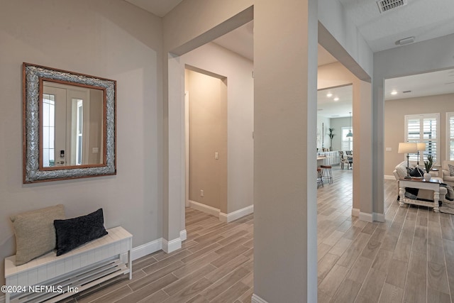 hall featuring light hardwood / wood-style flooring