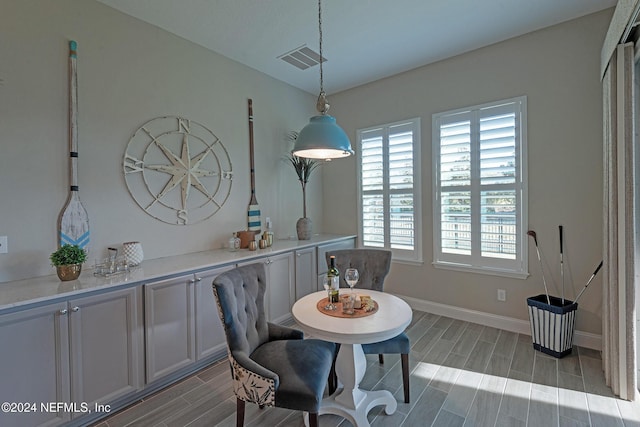 dining area with light wood-type flooring