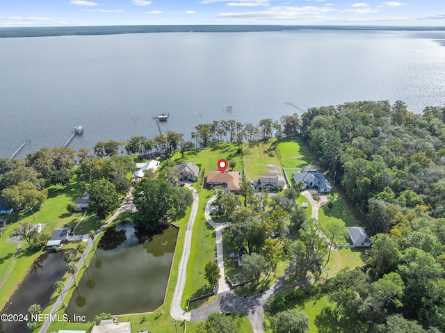 bird's eye view with a water view