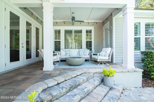 view of patio with ceiling fan, an outdoor hangout area, and french doors