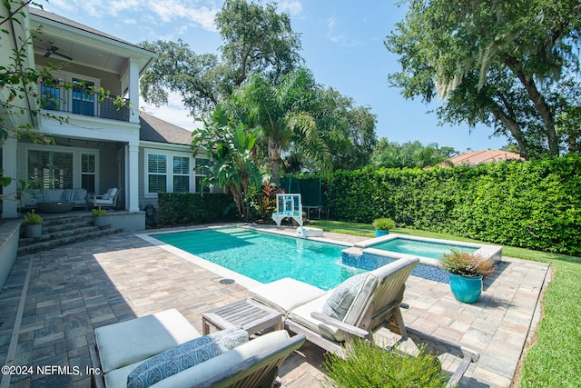 view of swimming pool with an outdoor hangout area and a patio area