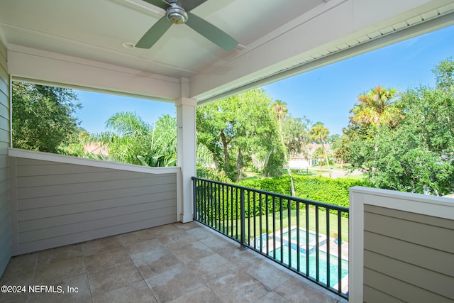 balcony featuring ceiling fan