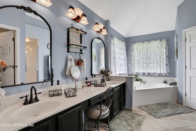 bathroom with plenty of natural light, a tub, vaulted ceiling, and vanity