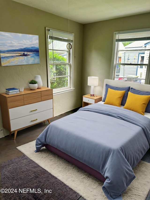 bedroom featuring dark hardwood / wood-style floors