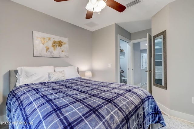 bedroom featuring a closet, ceiling fan, and carpet