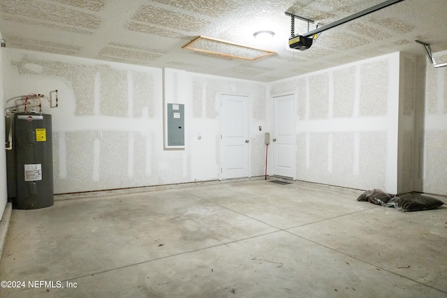 garage with a garage door opener, electric panel, and electric water heater