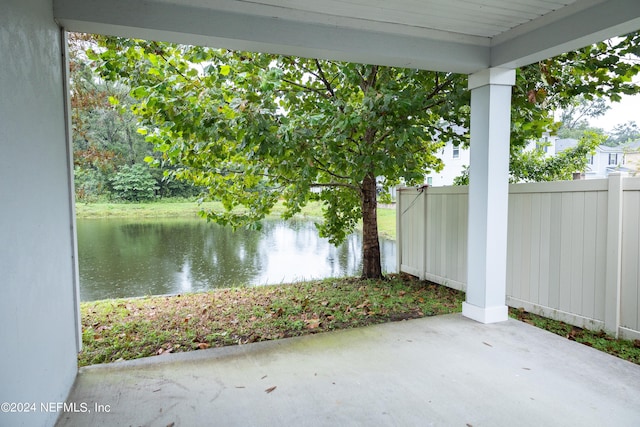 view of patio featuring a water view